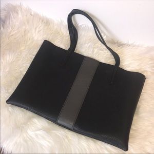 Brand new tote still in dust cover.. Great tote